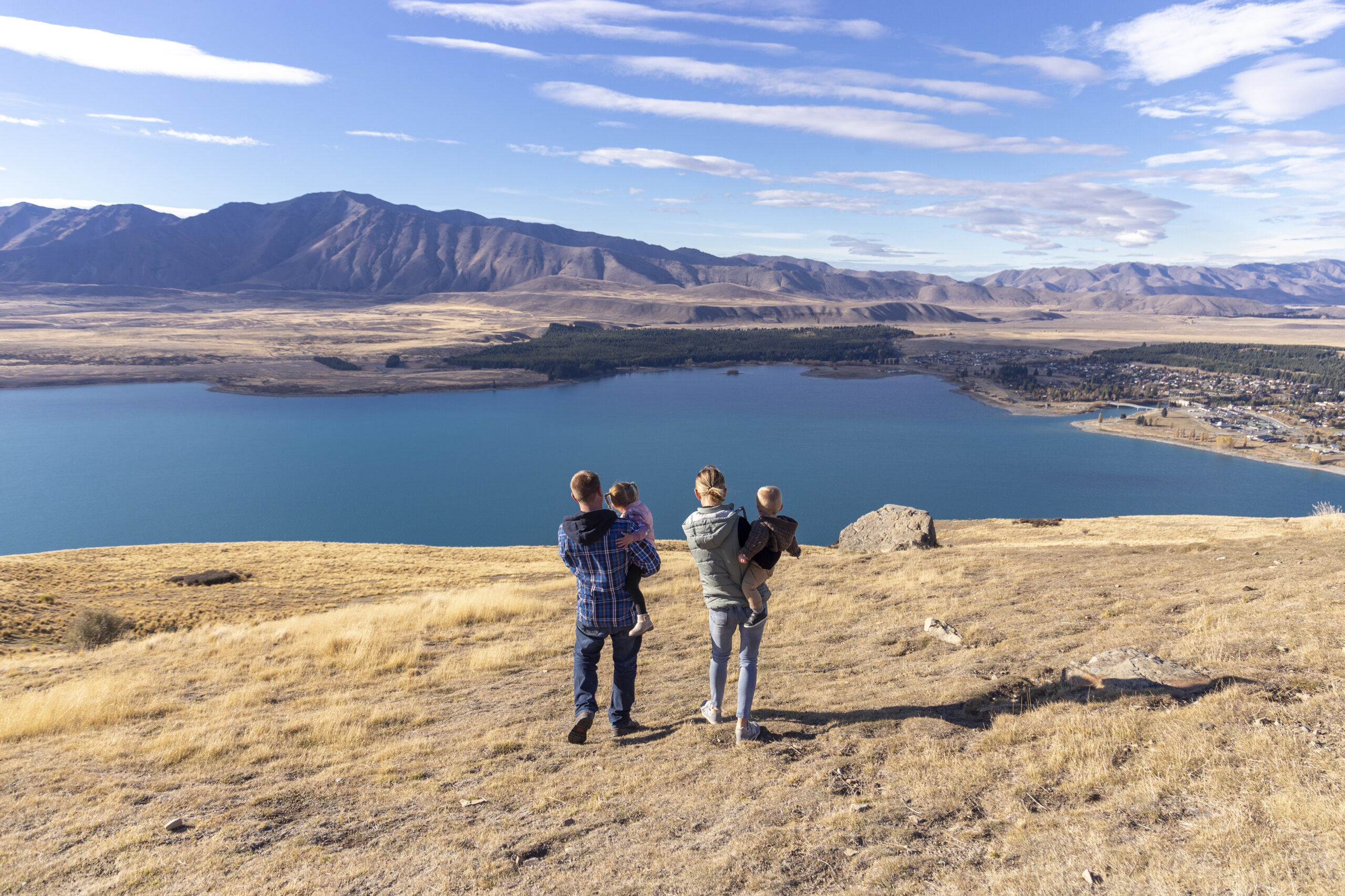 Family at Mount John Summit, Overlooking Lake Tekapo