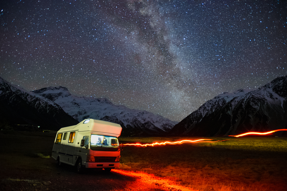 Camper under the stars in Aoraki Mount Cook National Park Dark Sky Reserve